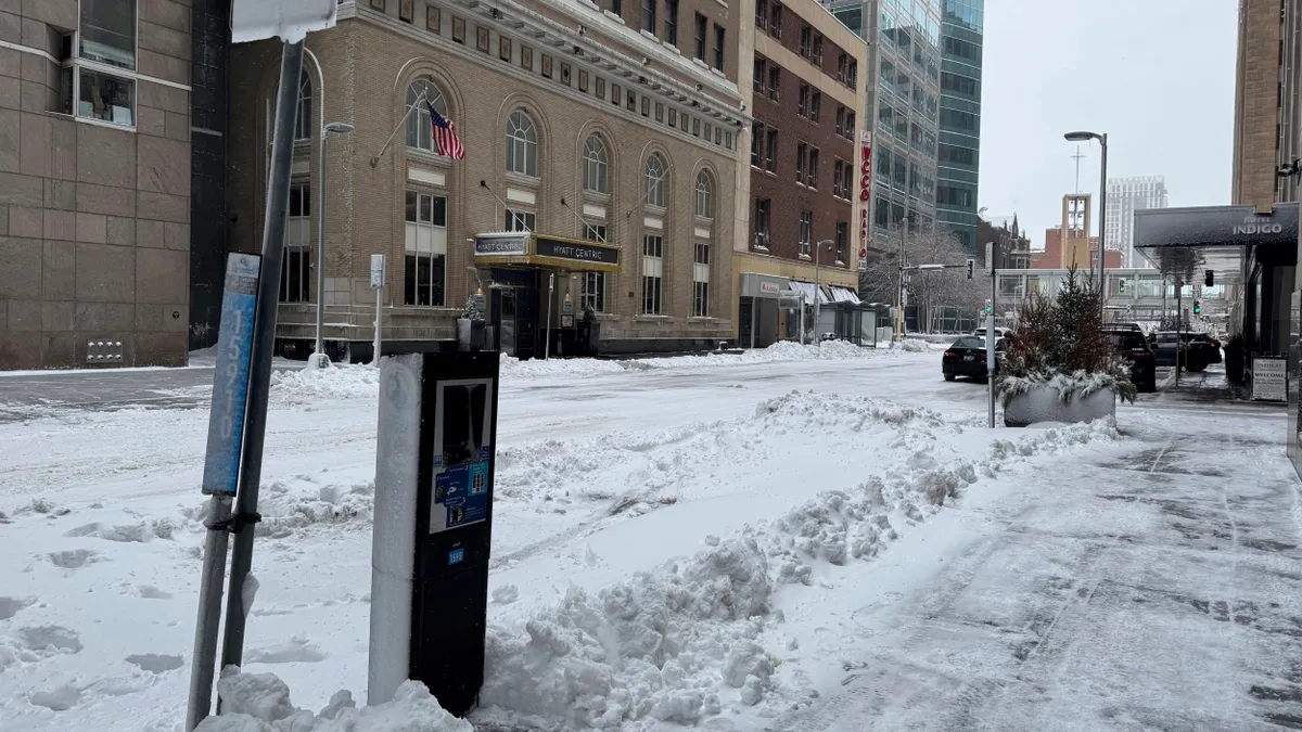 Snow coats a road in Minneapolis on March 5, 2025.