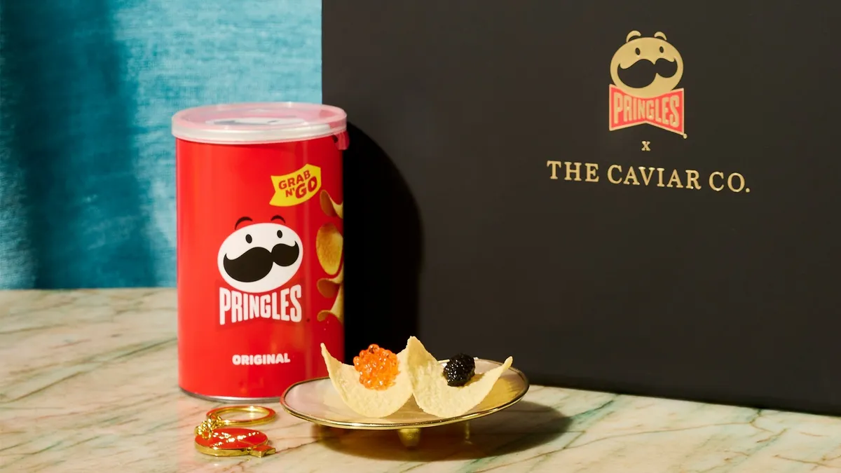 A can of Pringles and caviar on two chips