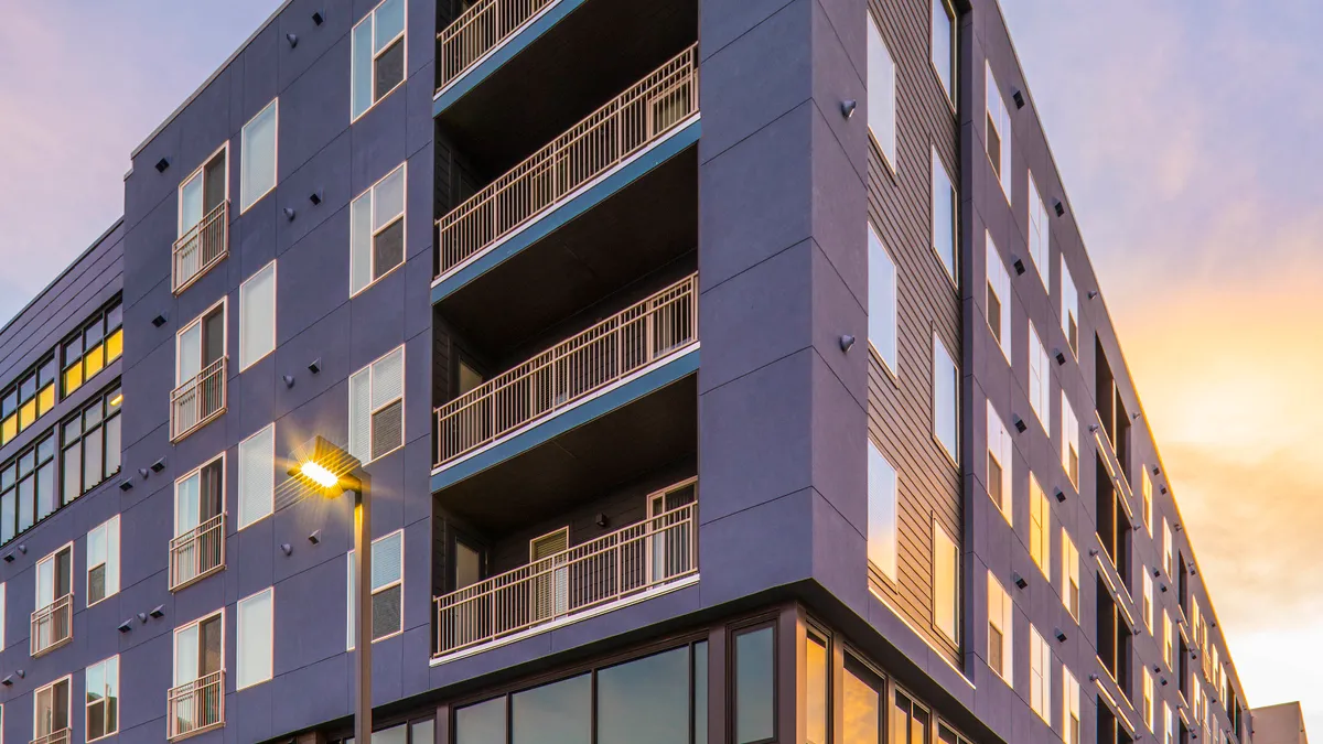 Corner view of mid-rise apartment property