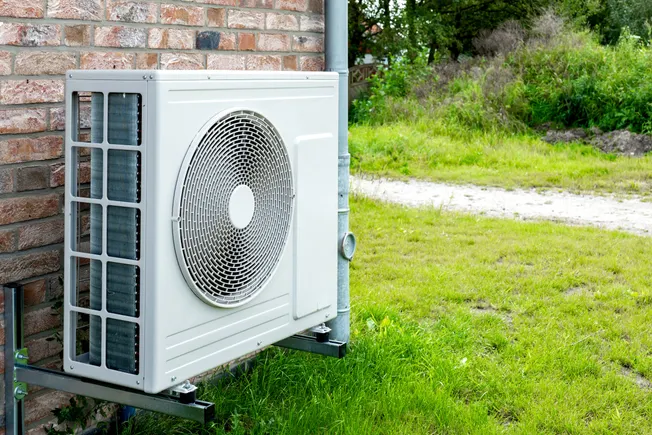 Heat pumps are still expensive. Cities can help.