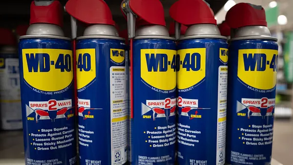 WD-40 products sit on a home improvement store shelf.