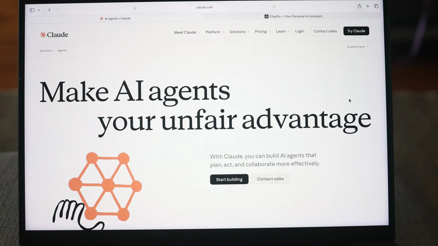 A laptop's screen shows the website of an AI service