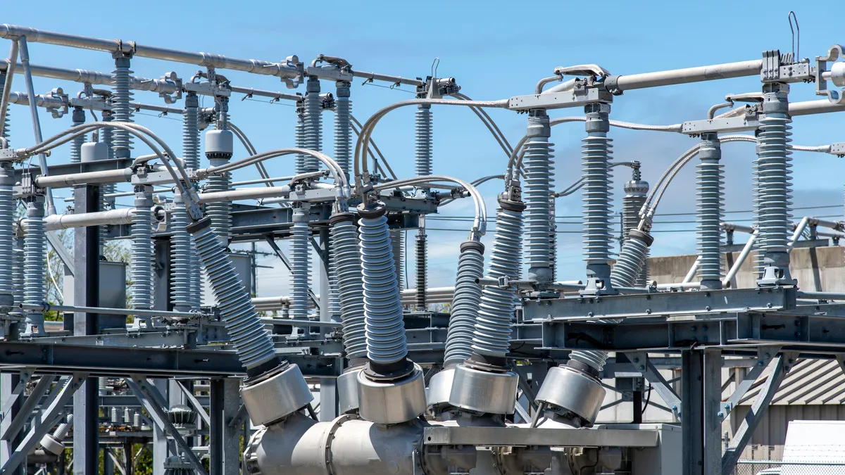 A high-voltage electric transformer at a utility substation.