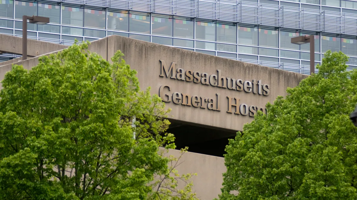 A sign for Massachusetts General Hospital adorns the parking garage at the hospital.
