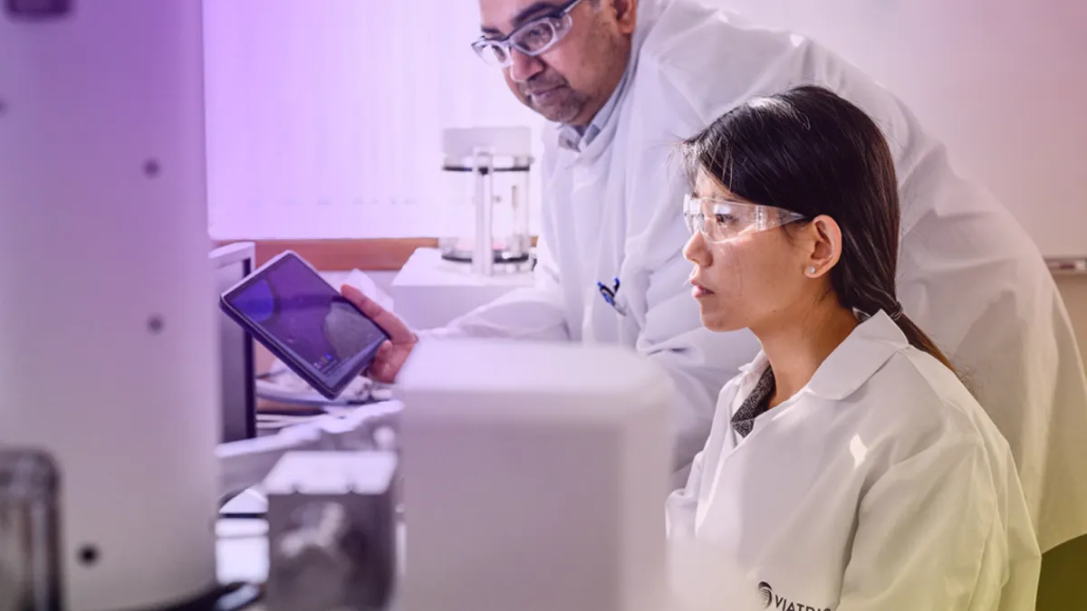Doctors working in lab