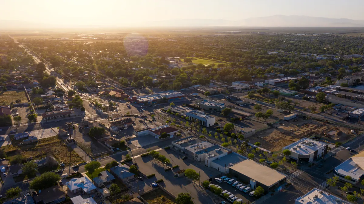 Sunset aerial view of downtown and surrounding housing of Lancaster, California, USA.