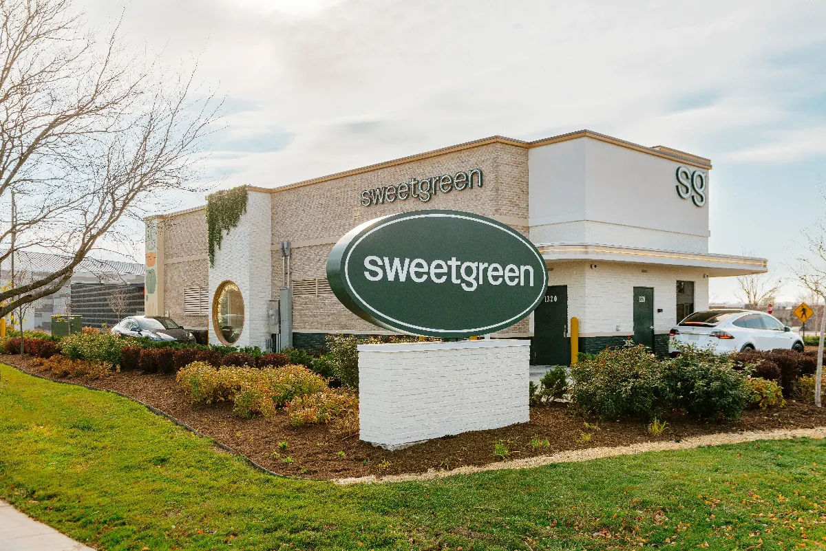An image of a Sweetgreen restaurant with a drive-thru