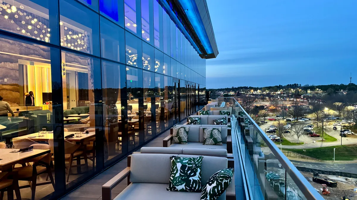 Couches on a terrace overlooking Gwinnett, Georgia.