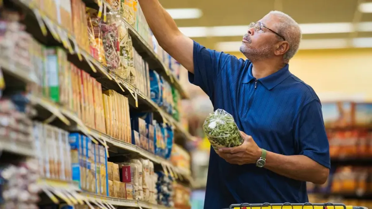 A man grocery shopping