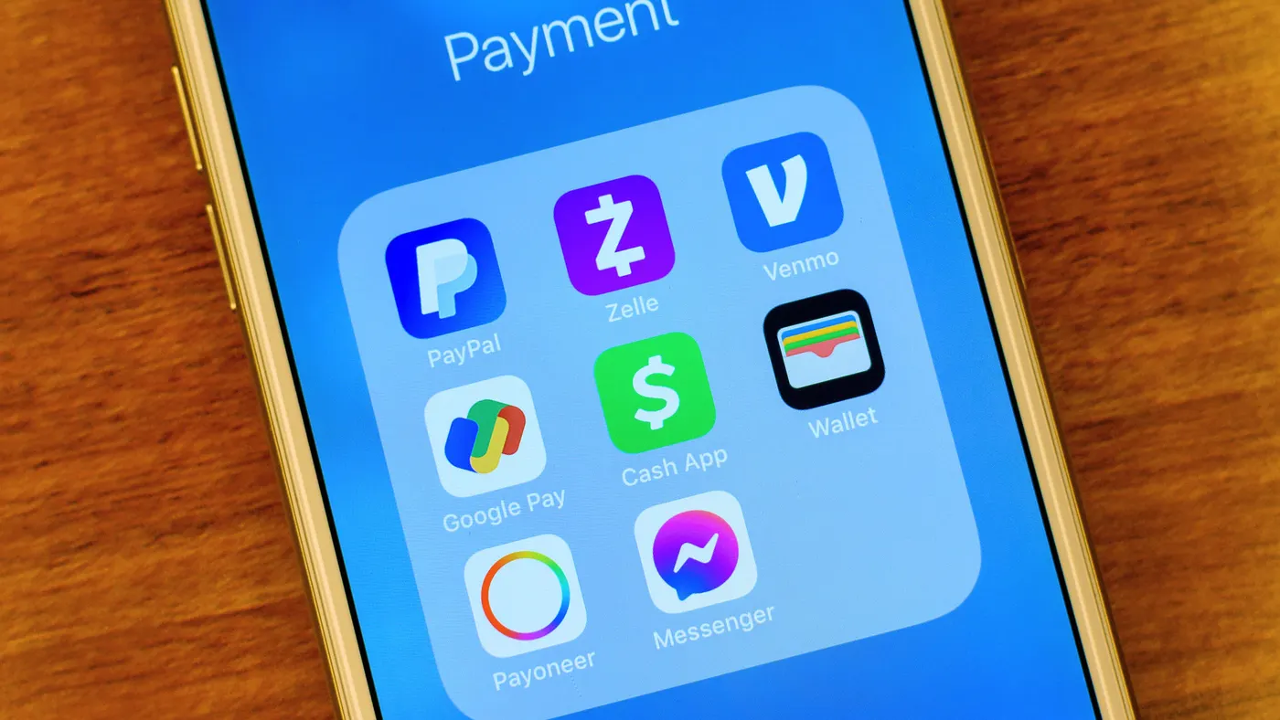 A smartphone screen displaying the logos of various peer-to-peer payment apps, including PayPal, Zelle, Venmo, Google Pay, Cash App, Apple Wallet, Payoneer, and Facebook Messenger.