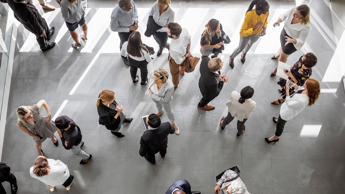 People speaking during a conference event.