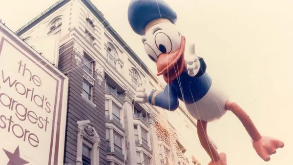 A Donald Duck balloon in a vintage photo of the Macy's parade.