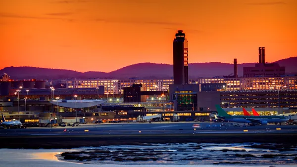 An airport at sunset.