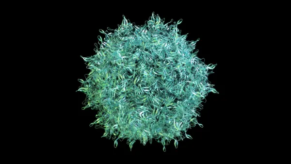 A rendering of an adeno-associated virus, colored blue-green, on a black background.