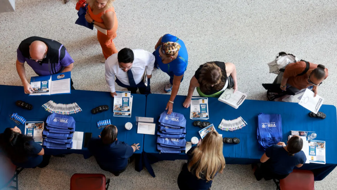 an overhead shot of jobseekers at a job fair