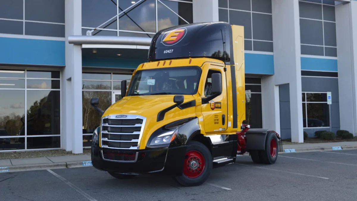 An Estes CNG tractor in a parking lot