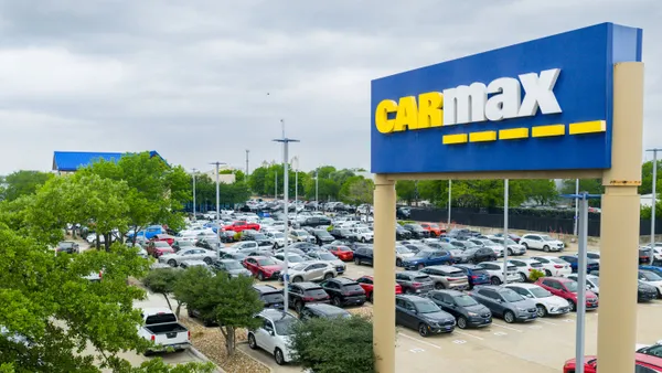 In an aerial view, vehicles are displayed for sale on a lot at a CarMax dealership on April 15, 2026 in Austin, Texas.