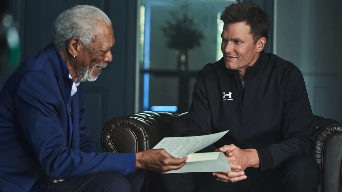 Morgan Freeman and Tom Brady sit together as part of an Under Armour campaign