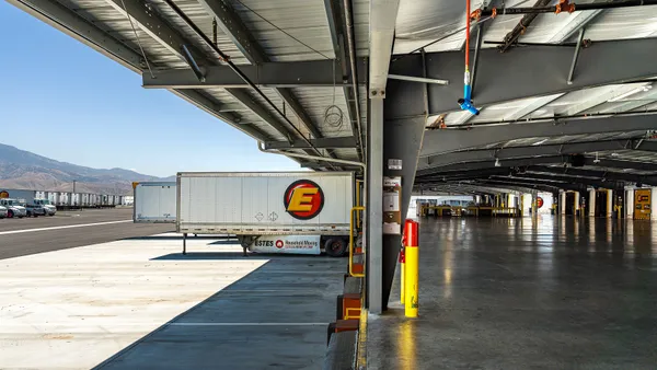 A photo shows the interior and exterior of Estes Express Lines' new LTL terminal in Banning, California.