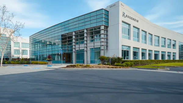 An office building with the name "Rosendin" on the front.