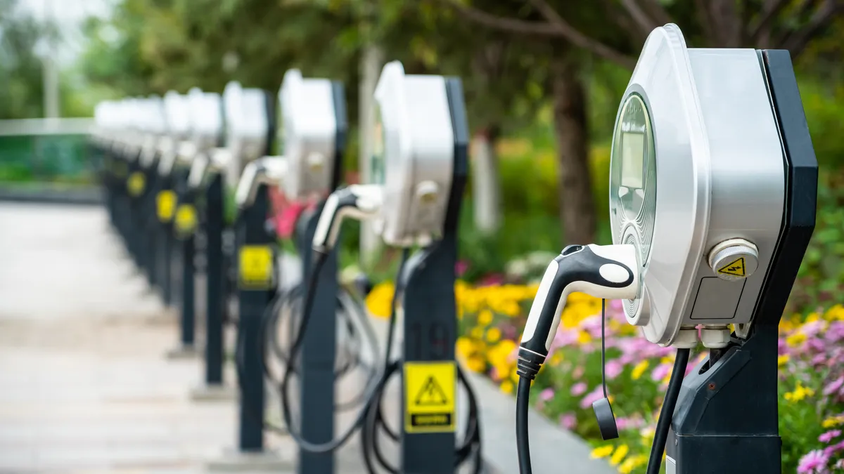 A row of electric vehicle chargers.