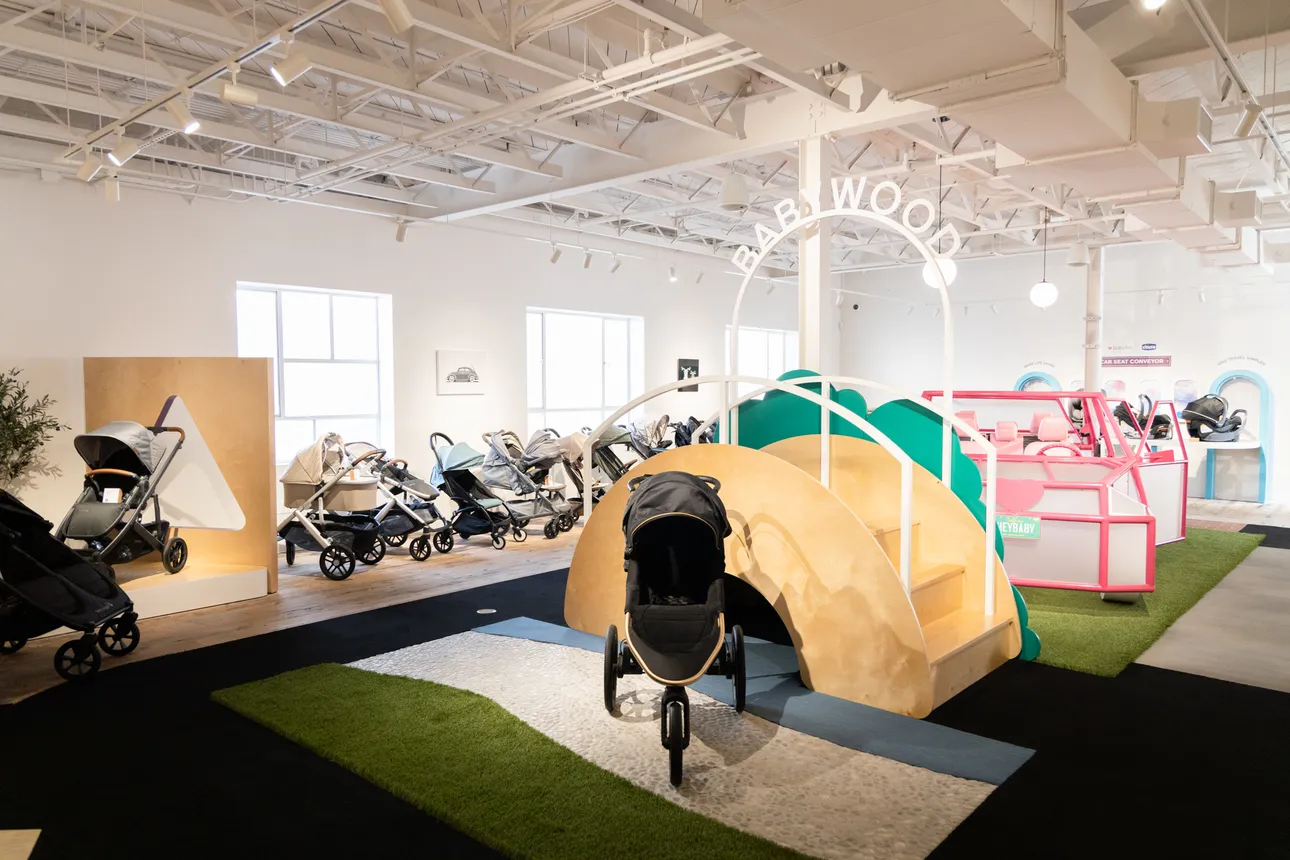 Various strollers set up around a testing area in Babylist's Beverly Hills showroom.