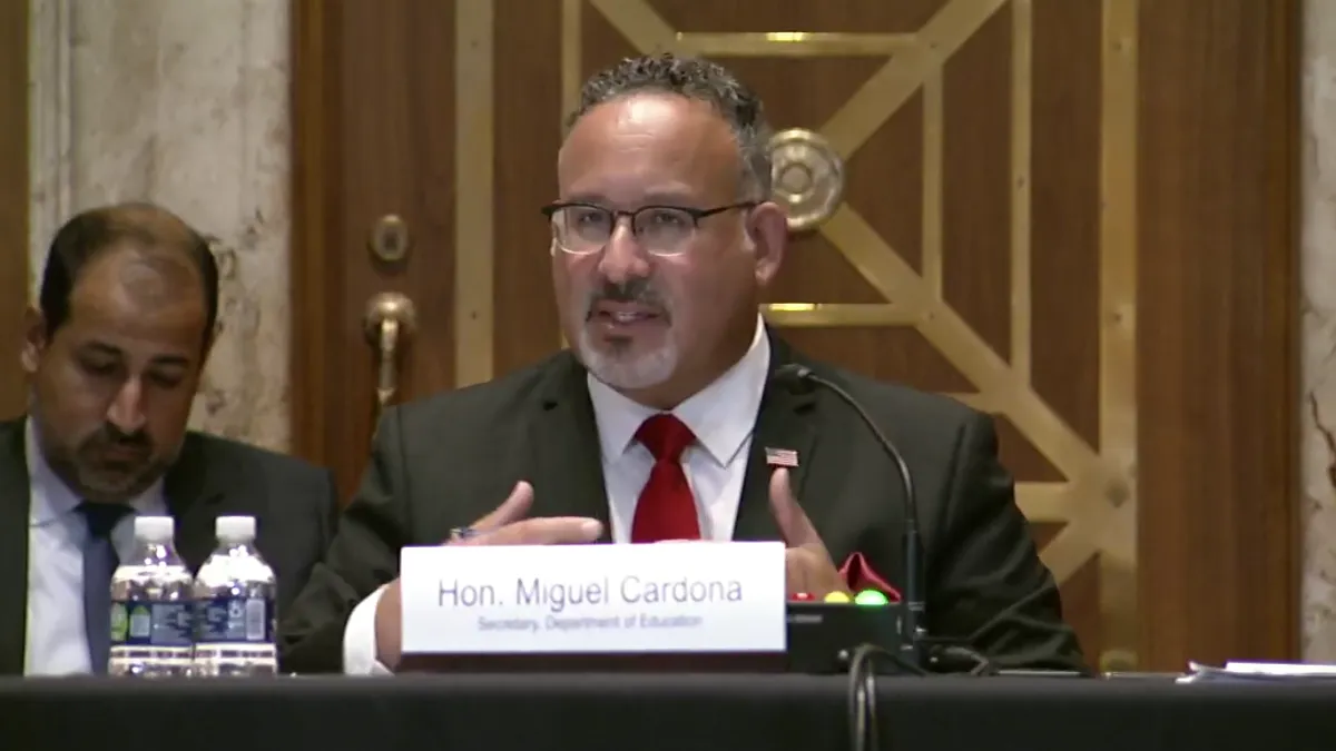 U.S. Secretary of Education Miguel Cardona testifies before the U.S. Senate Committee on Appropriations in a hearing that included discussion of the "pass the trash."