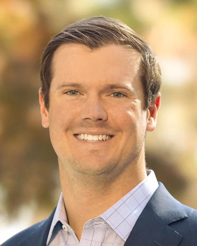 A headshot of Carter Schmid