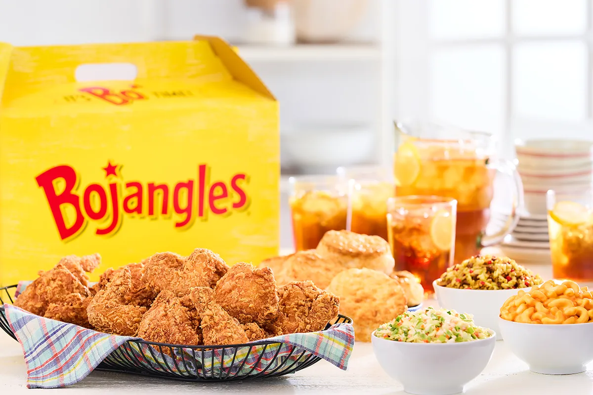 Bojangles family pack with a yellow and red box, biscuits, chicken and sides