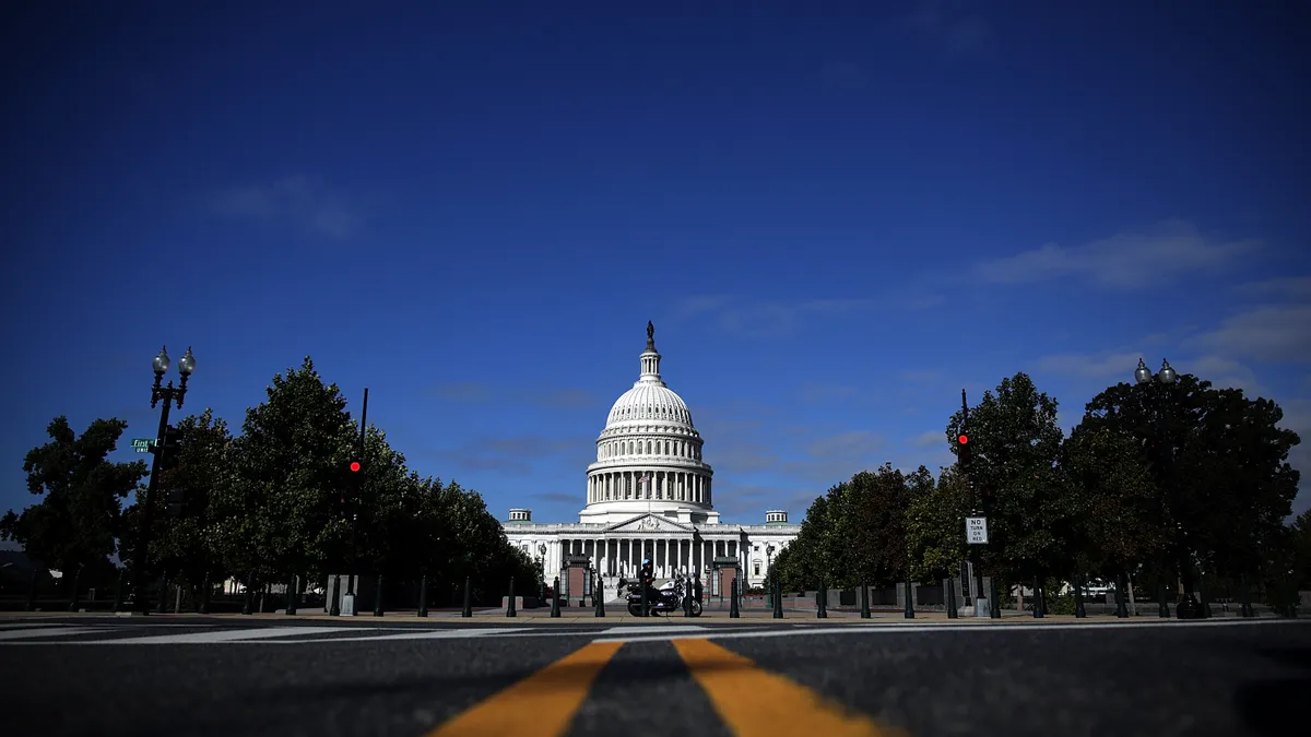 The United States Capitol Building seen at a distance.