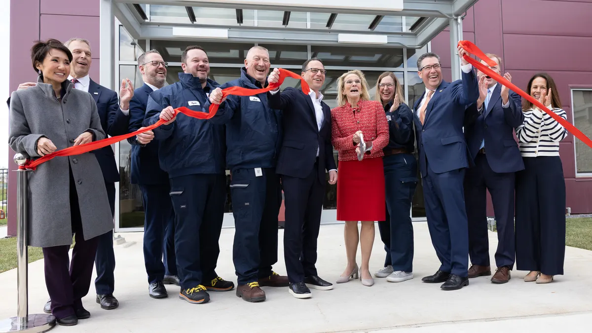 Hershey CEO Michele Buck and others open a new chocolate processing plant.