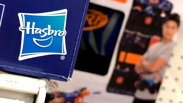 A box labeled "Hasbro" is displayed, along with other store products.