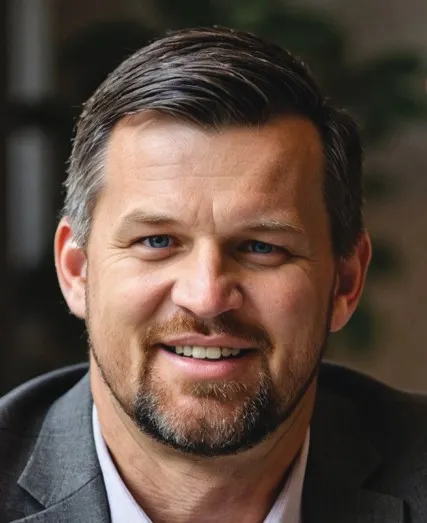 Headshot of Cameron Gunter, co-CEO of PEG