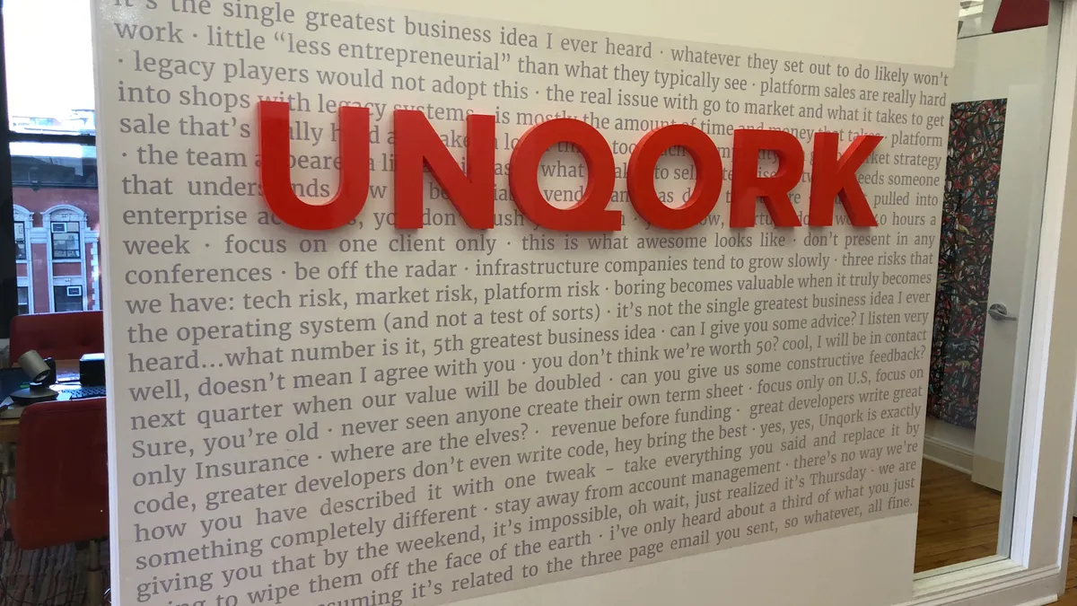 The feedback wall inside Unqork's offices in New York.