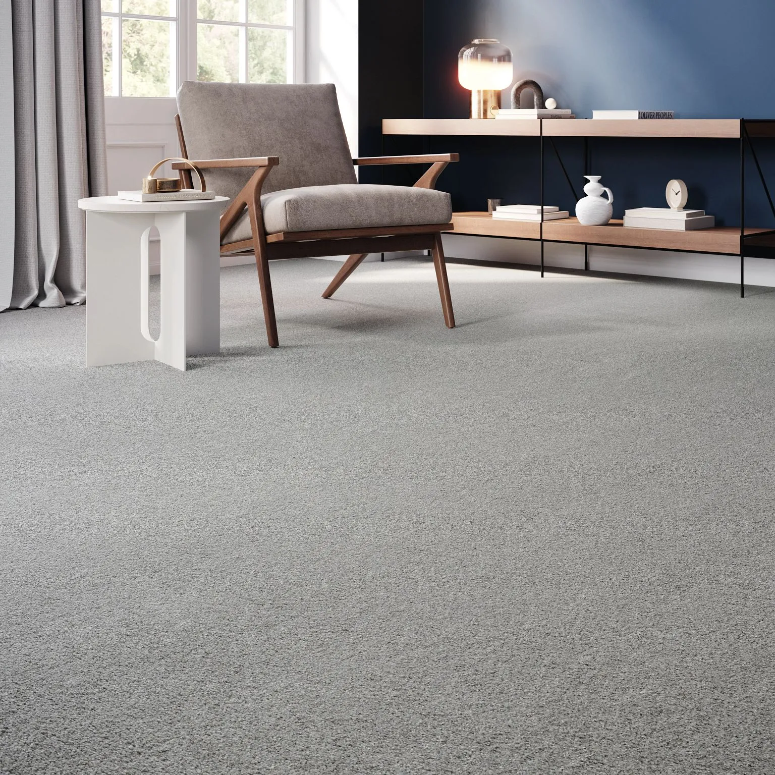 A living room with a chair, table and carpet.