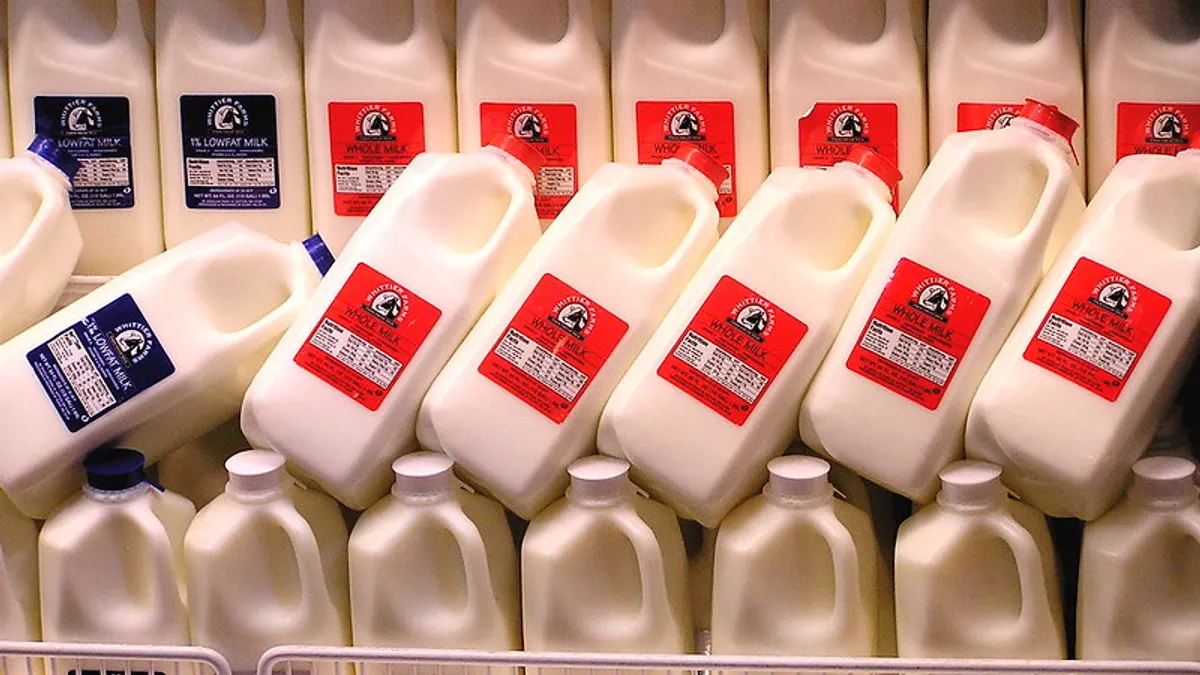 milk containers at a grocery store