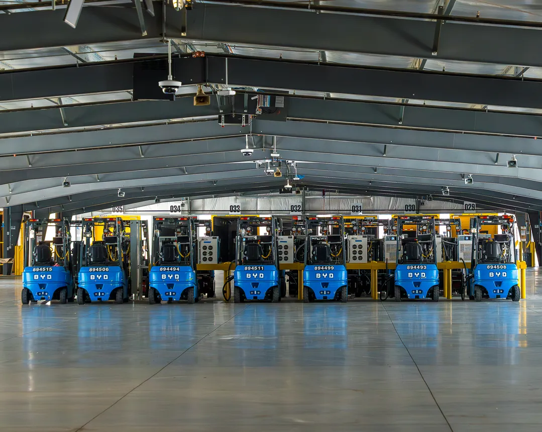 Electric forklifts are parked inside Estes' new LTL terminal in Banning, California.