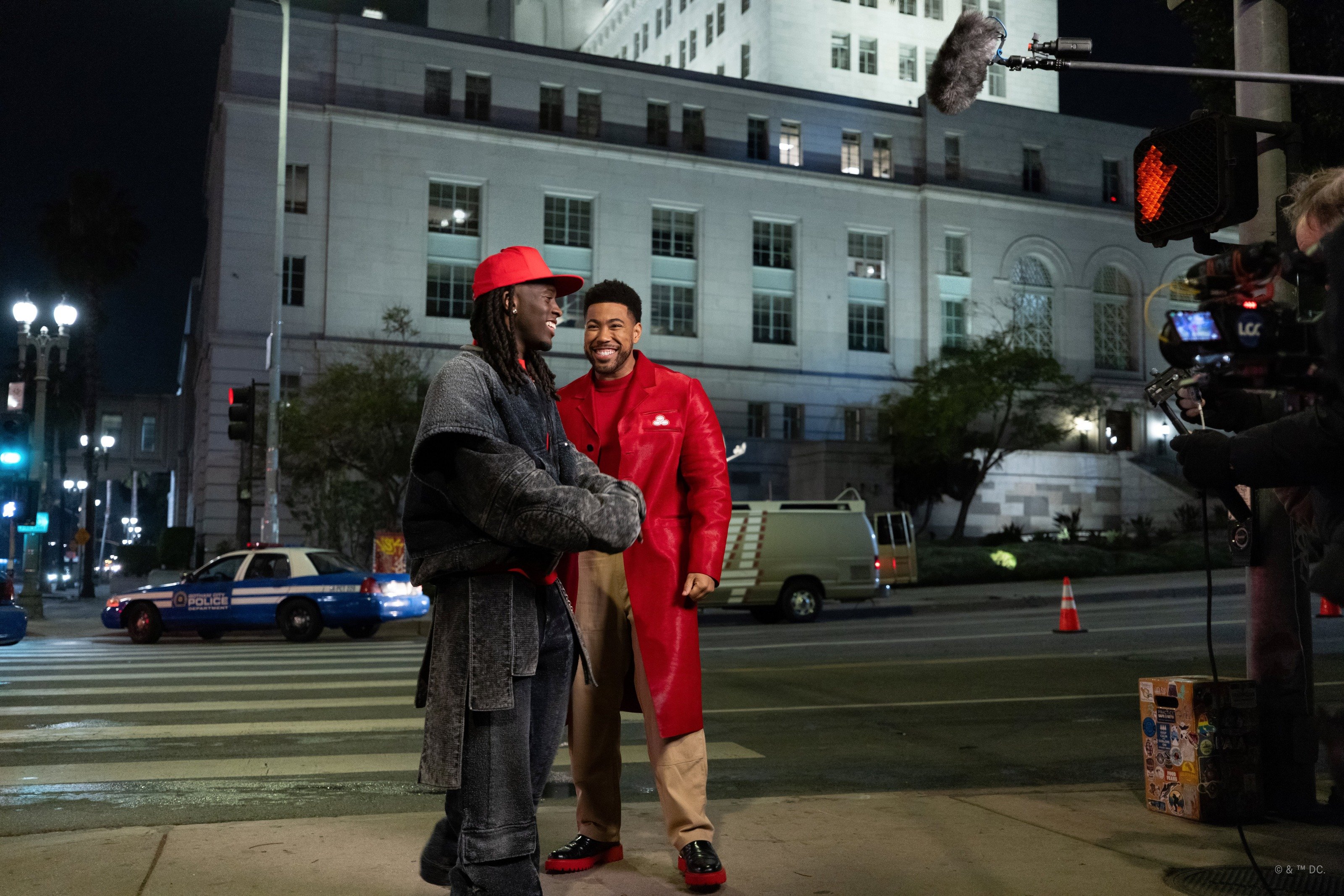 State Farm mascot Jake from State Farm stands with influencer Kai Cenat outside while on set for the brand's 