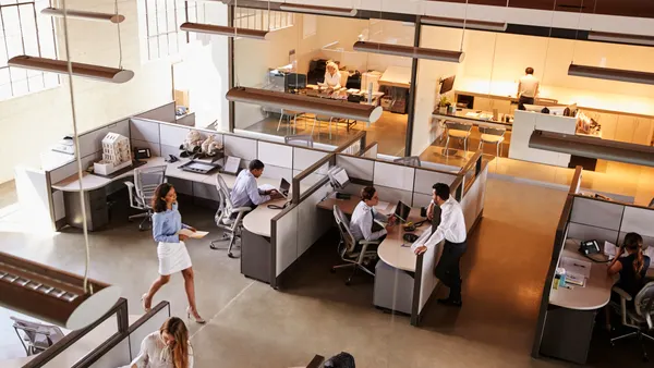Elevated view of a busy, open plan office.