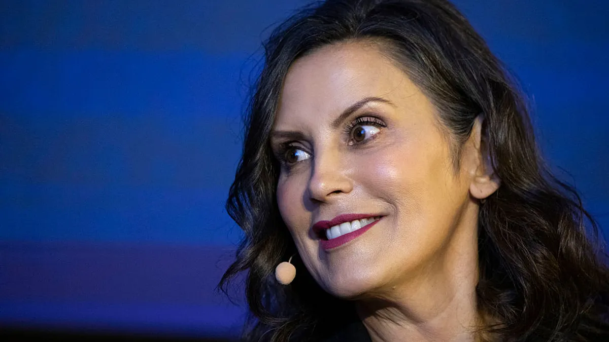 A close-up shot of Gretchen Whitmer smiling.
