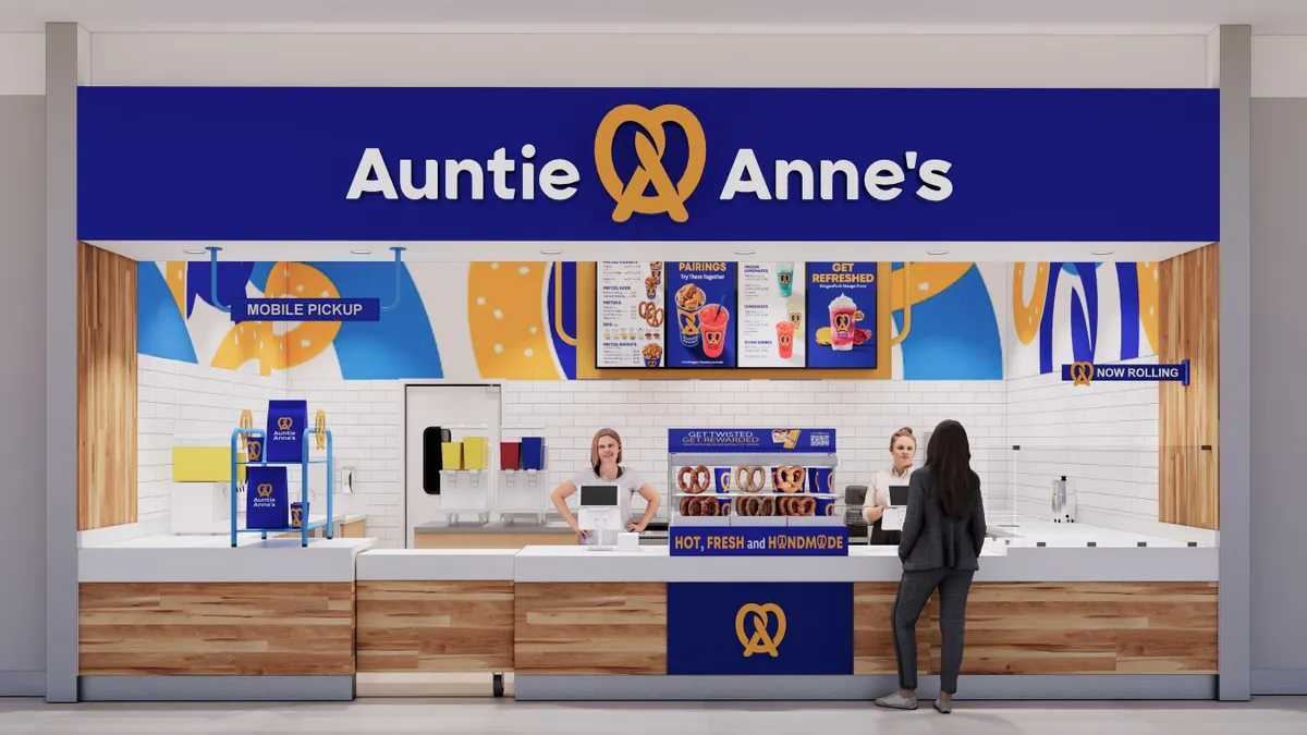 A rendering of a storefront with blue banner that says Auntie Anne's