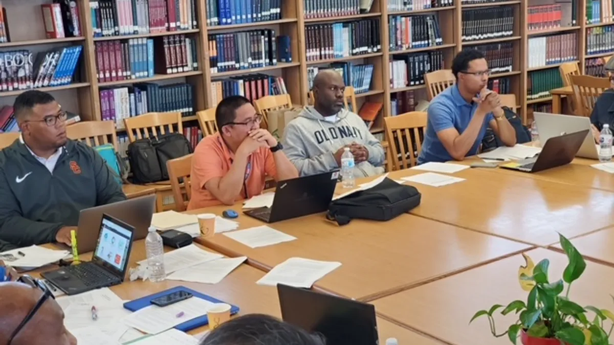 Participants of the Compton Male Teachers of Color Network gather in 2019 during a Saturday meeting.