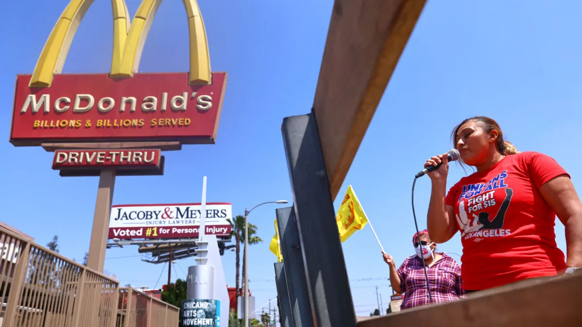 McDonald’s employee Nidia Torres speaks at a rally of fast food workers and supporters for passage of AB 257, a fast-food worker health and safety bill, on April 16, 2021