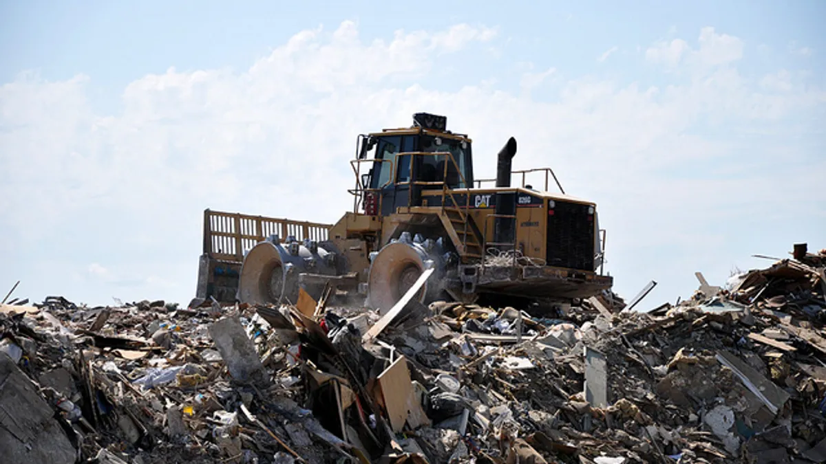 MINOT, N.D. -- Debris removed from flooded homes here is taken to a city landfill, Aug.4, 2011.