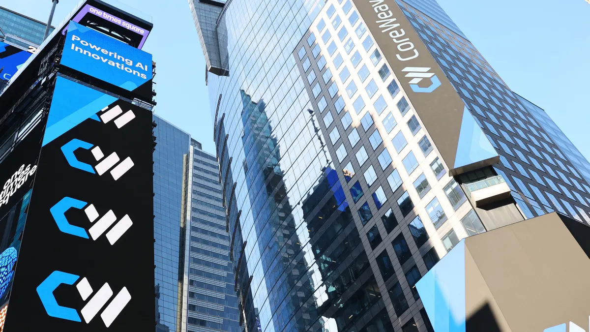 The CoreWeave name and logo displayed on digital billboards in Times Square for the neocloud provider's IPO on March 28, 2025 in NYC.