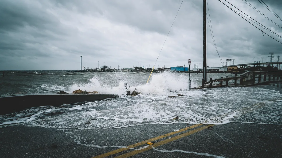 Water crashing over bridge during Hurricane Harvey in Kemah, Texas.