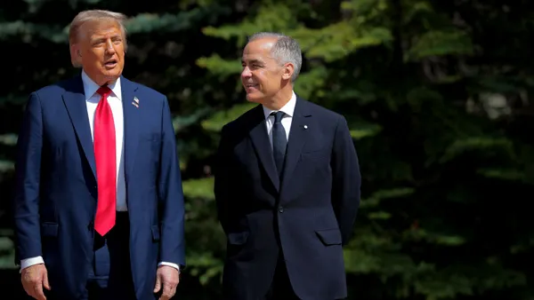 Canada Prime Minister Mark Carney (right) and U.S. President Donald Trump (left) speak at the G7 Summit in Kananaskis, Alberta, on June 16, 2025.