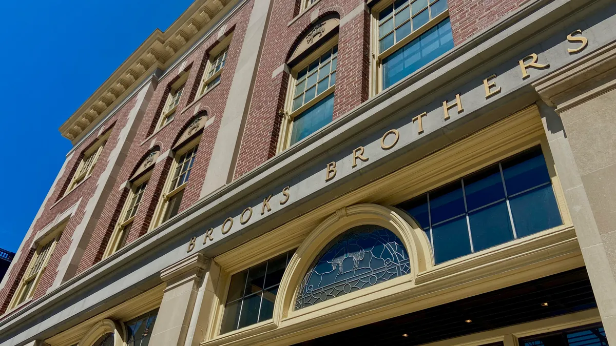 A building with "Brooks Brothers" in gold lettering.