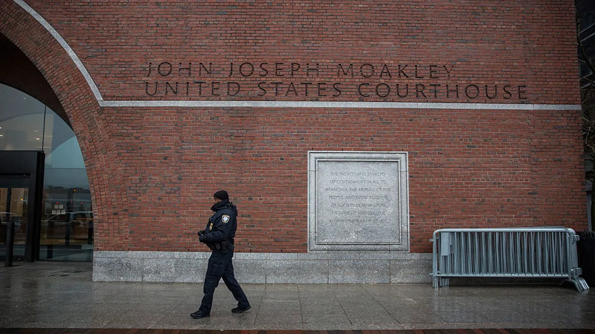 Police guard entrance to Moakley federal courthouse in Boston