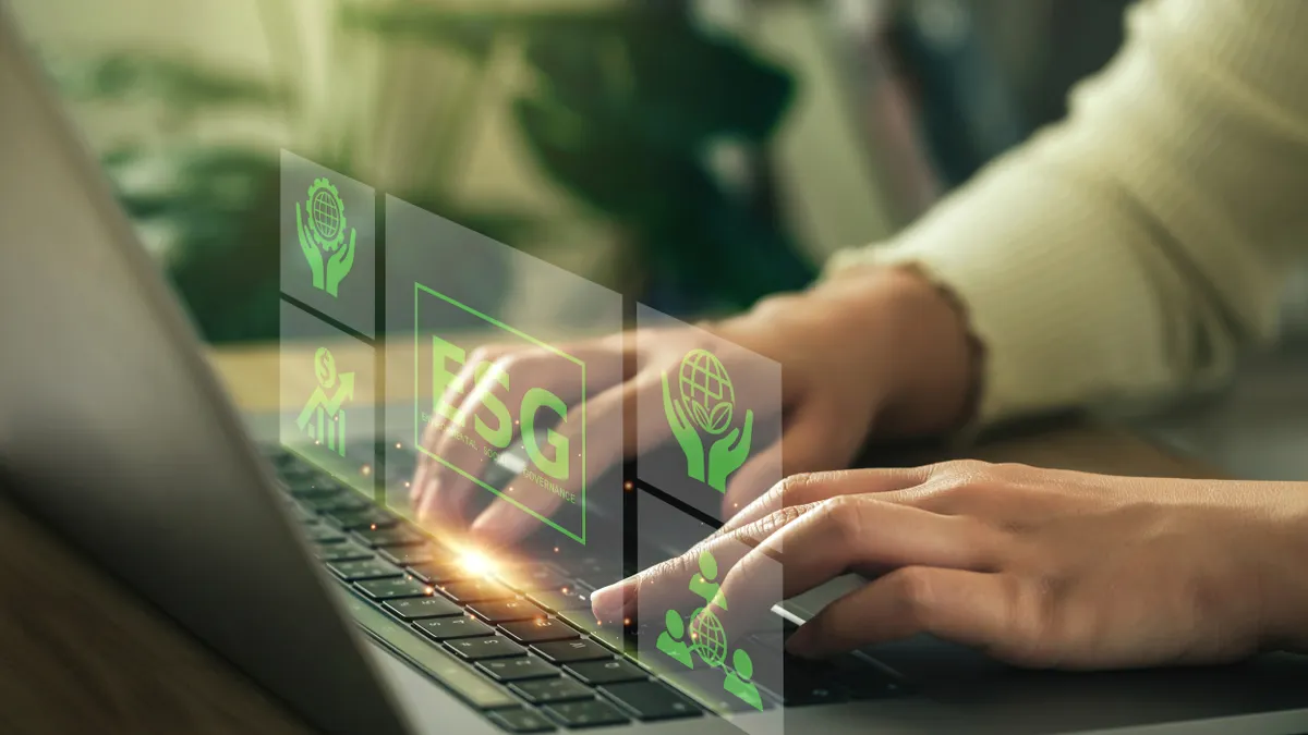 Woman uses a computer to analyze ESG, surrounded by ESG icons.